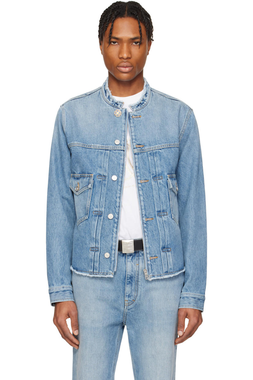 Non-stretch denim jacket. Fading and frayed edges throughout.

· Stand collar
· Zip closure with button placket
· Crystal-cut and beaded button at collar
· Pleats at front
· Flap pockets
· Curved hem
· Buttoned barrel cuffs
· Embroidered logo patch at back collar
· Cinch strap at back hem
· Partial herringbone lining
· Logo-engraved silver- and gold-tone hardware
· Contrast stitching in tan

Supplier color: Indigo blue