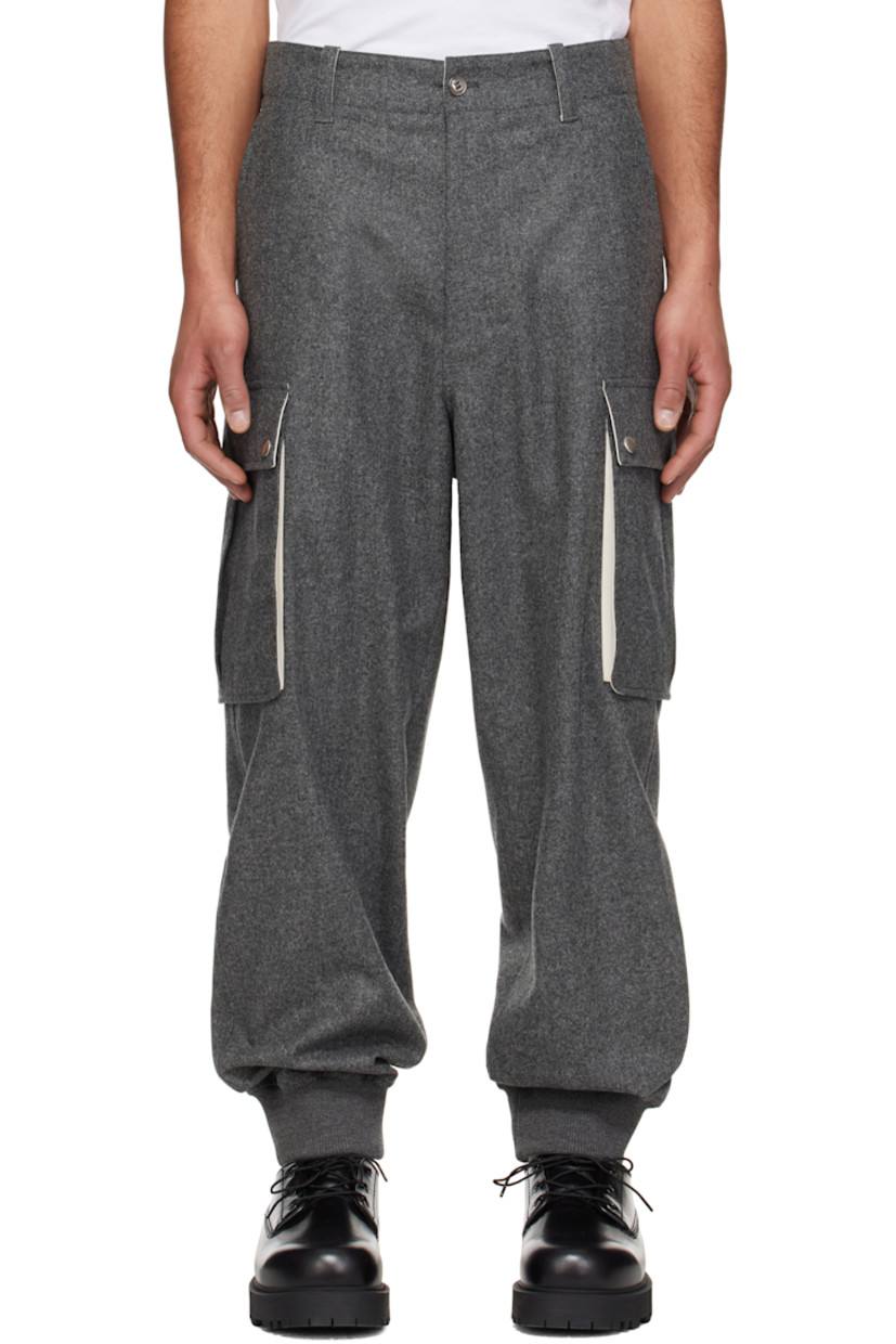 Wool felt cargo pants.

· Belt loops
· Four-pocket styling
· Zip fly
· Rib-knit cuffs
· Cargo pocket at outseams
· Darts at back waistband
· Logo-engraved silver-tone hardware

Supplier color: Medium grey