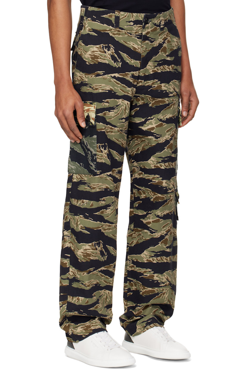 Cotton canvas cargo pants. Camouflage pattern printed throughout.

· Belt loops
· Four-pocket styling
· Zip fly
· Cargo pockets at outseams
· Logo embroidered at cargo pocket

Supplier color: Multicolored