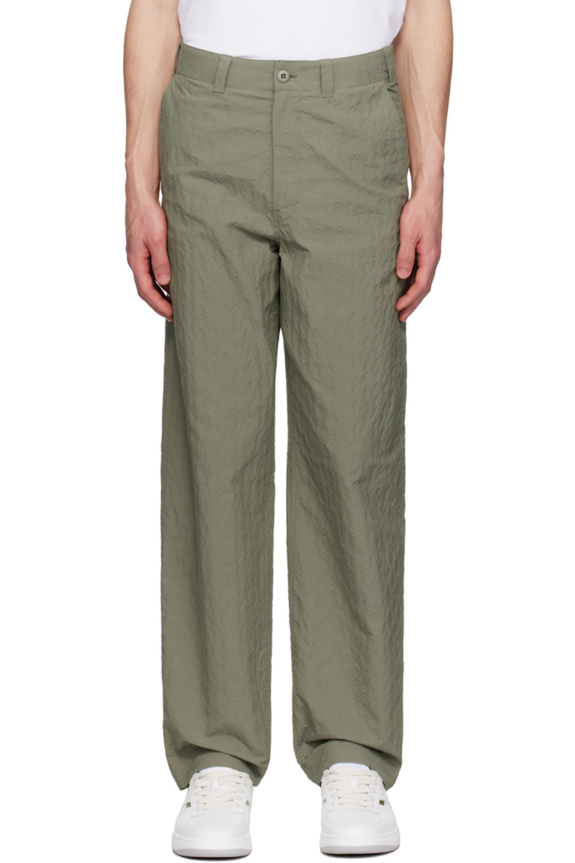 Relaxed-fit nylon-blend canvas trousers. Jacquard logo pattern throughout.

· Belt loops
· Four-pocket styling
· Zip fly

Supplier color: Almond green