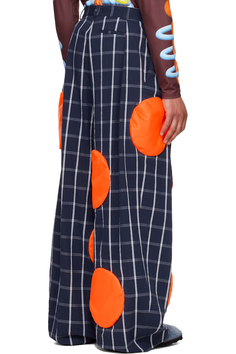 Stretch cotton-blend seersucker trousers. Check pattern and padded circular appliqués throughout.

· Belt loops
· Three-pocket styling
· Zip fly
· Pleats at front

Supplier color: Navy