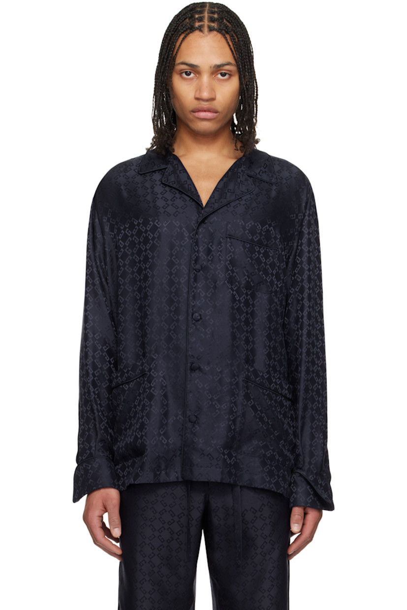 Loose-fit silk poplin pyjama shirt. Piping and jacquard logo pattern throughout.

· Open spread collar
· Button closure
· Patch pockets
· Vented side seams
· Dropped shoulders
· Pleats at single-button barrel cuffs
· Twin pleats at back yoke

Supplier color: Dark blue