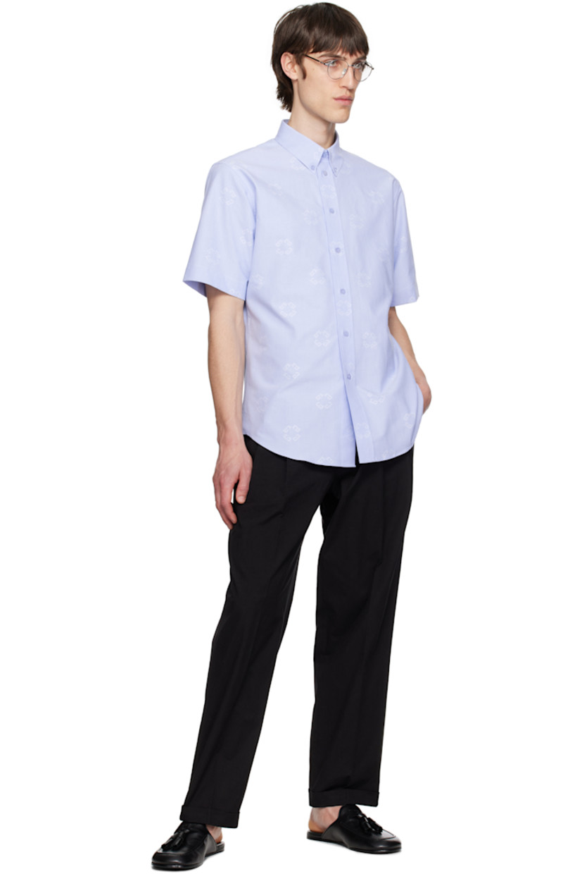 Cotton oxford cloth shirt. Jacquard logo pattern throughout.

· Spread collar
· Button closure
· Shirttail hem
· Box pleat at back yoke

Supplier color: Baby blue