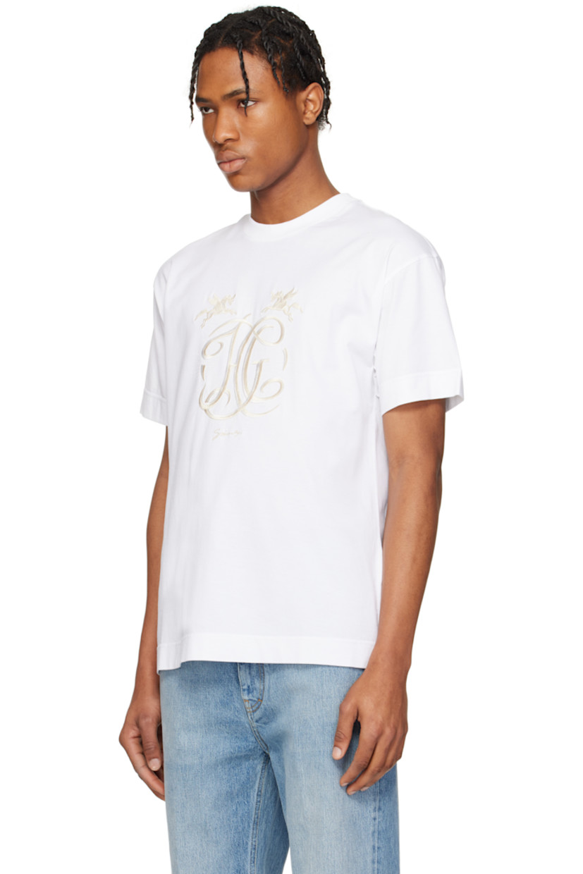 Cotton jersey T-shirt.

· Rib-knit crewneck
· Graphics and logo embroidered at front

Supplier color: White