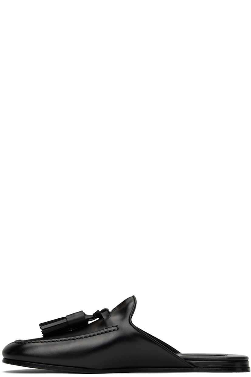 Buffed calfskin slippers in black.

· Moc toe
· Tassels and embossed logo at vamp
· Logo patch at padded calfskin footbed
· Polished leather sole with rubber injection

Supplier color: Black