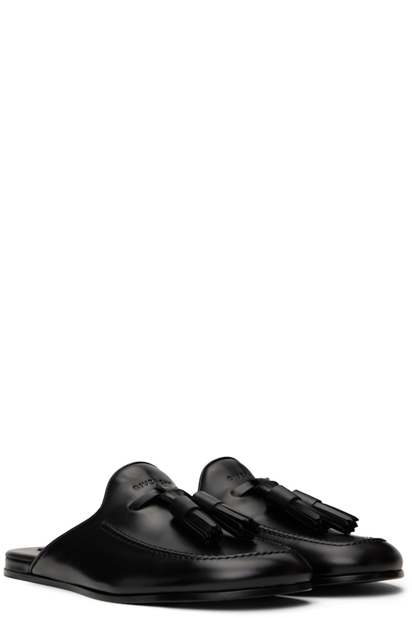 Buffed calfskin slippers in black.

· Moc toe
· Tassels and embossed logo at vamp
· Logo patch at padded calfskin footbed
· Polished leather sole with rubber injection

Supplier color: Black