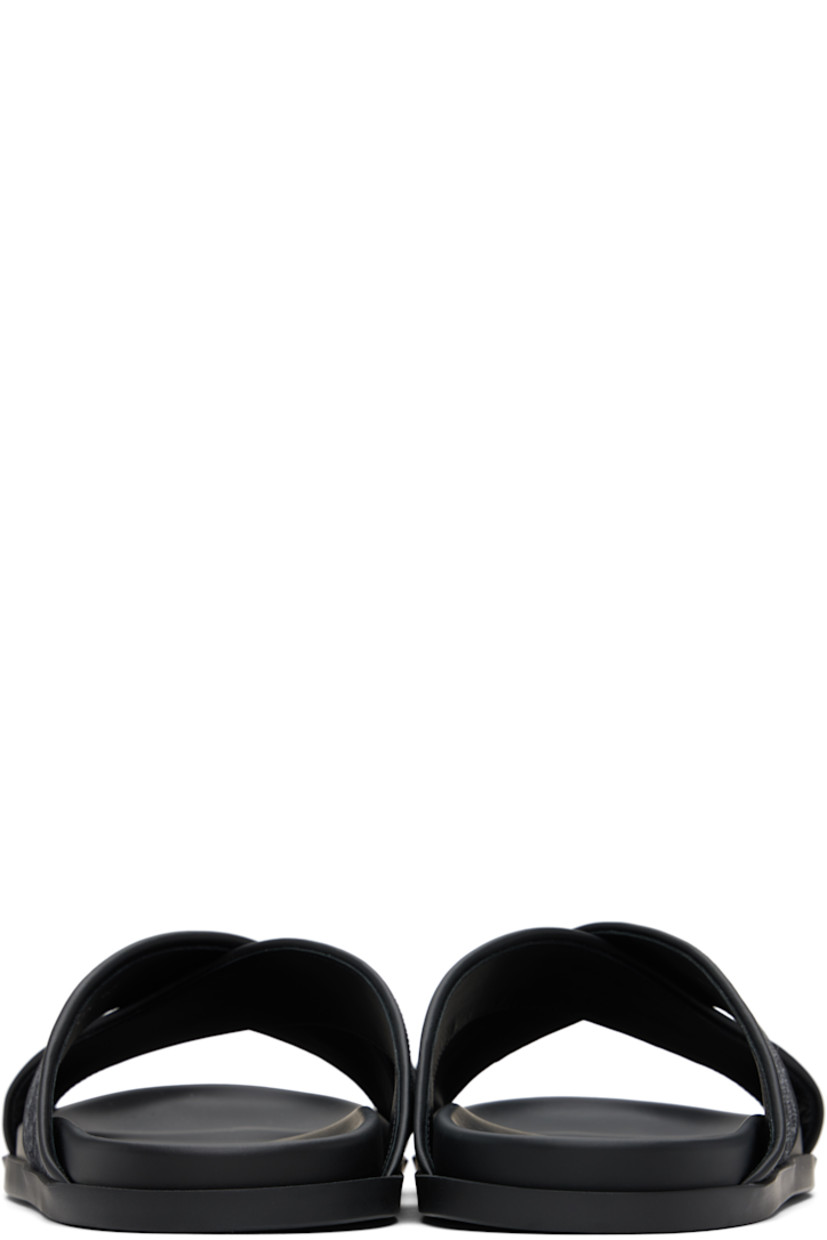 Denim and buffed calfskin pool slides in black.

· Logo pattern printed throughout
· Open toe
· Crisscrossing straps at vamp
· Buffed calfskin lining
· Logo printed at molded footbed
· Treaded rubber sole

Supplier color: Black