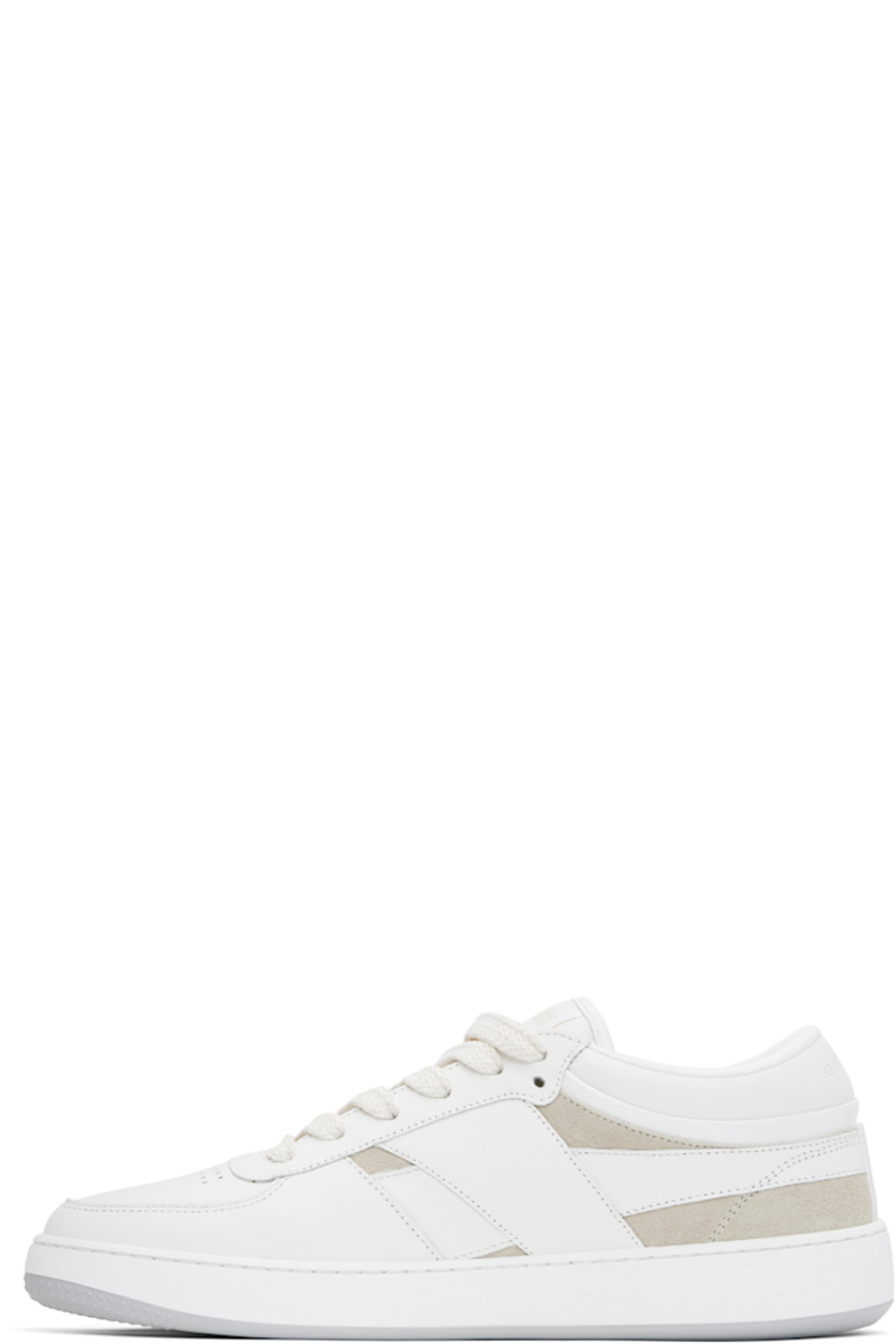 Low-top buffed calfskin and calfskin suede sneakers in white and beige. 

· Perforated detailing at toe
· Lace-up closure
· Logo patch at padded tongue
· Padded collar
· Reflective logo stamp at outer side
· Logo embossed at heel tab
· Suede and satin lining
· Logo embossed at textured rubber midsole
· Treaded rubber sole

Supplier color: White/Beige