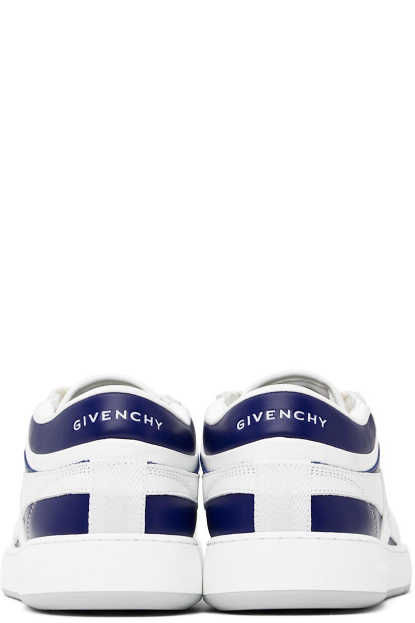 Low-top grained calfskin sneakers in white and navy.

· Perforations at toe
· Lace-up closure
· Logo patch at padded tongue
· Padded collar
· Logo stamp at outer side and heel tab
· Patent leather trim at heel tab
· Webbing trim at heel counter
· Mesh lining
· Logo embossed at textured rubber midsole
· Treaded rubber sole

Supplier color: White/Navy
