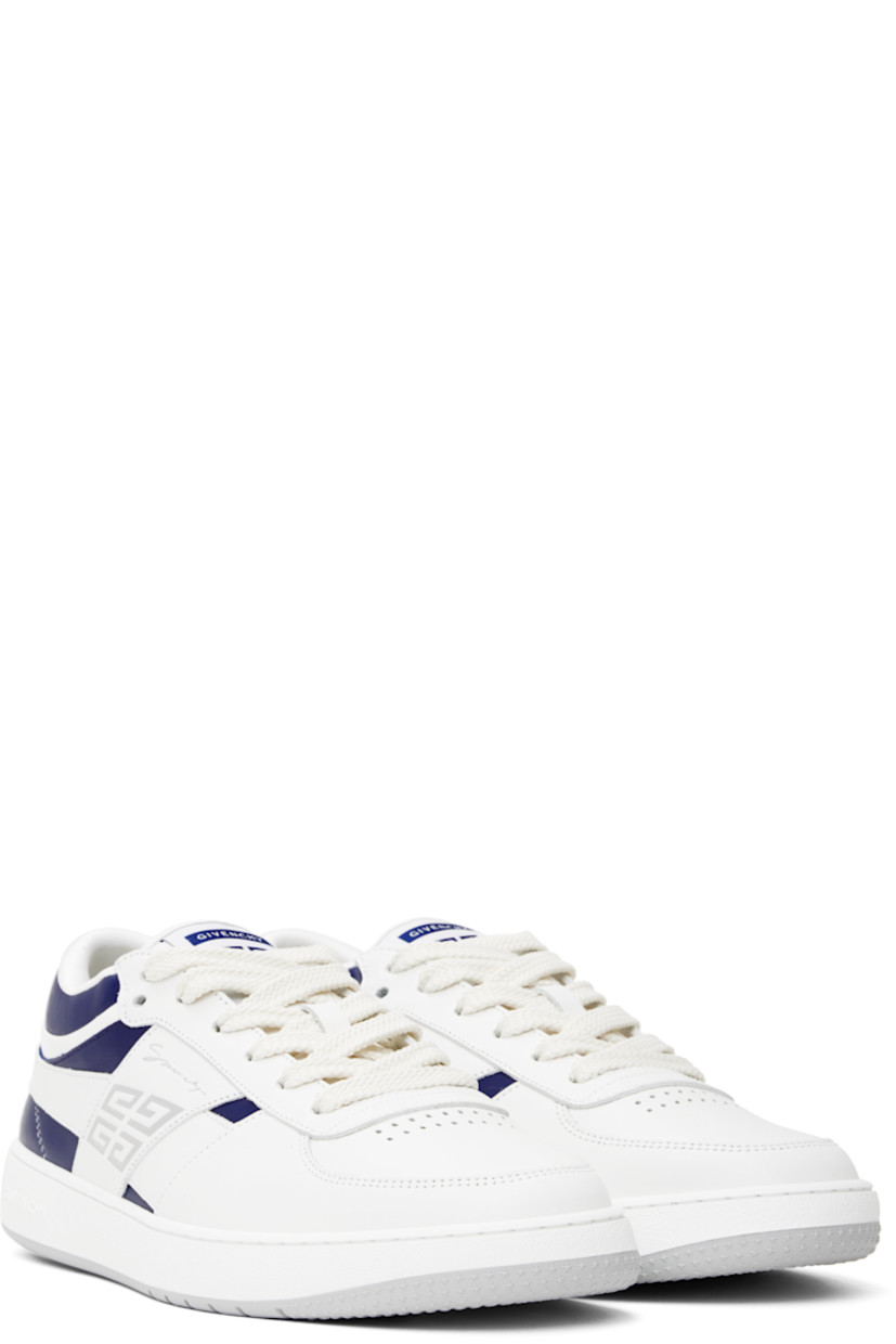 Low-top grained calfskin sneakers in white and navy.

�· Perforations at toe
· Lace-up closure
· Logo patch at padded tongue
· Padded collar
· Logo stamp at outer side and heel tab
· Patent leather trim at heel tab
· Webbing trim at heel counter
· Mesh lining
· Logo embossed at textured rubber midsole
· Treaded rubber sole

Supplier color: White/Navy