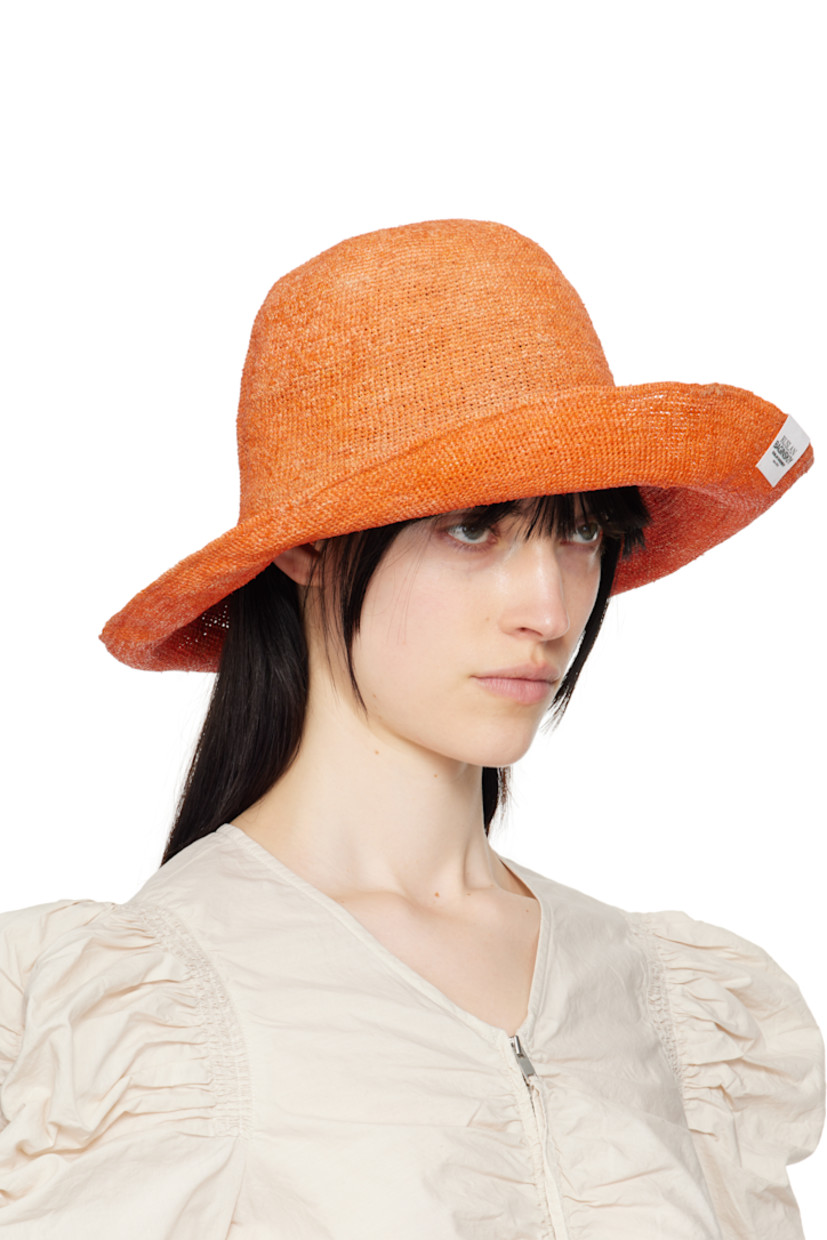 Woven straw bucket hat in orange. 

· Logo flag at brim
· Unlined

Supplier color: Orange