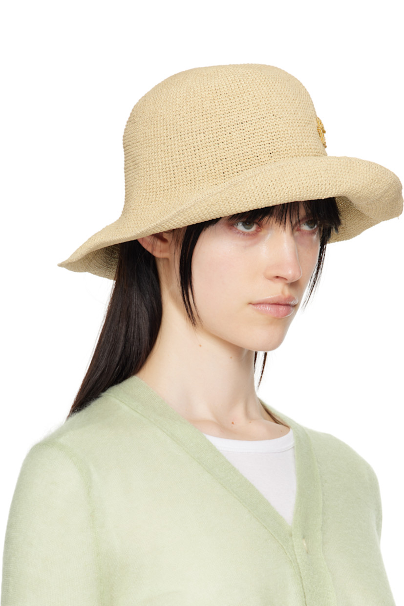 Lightweight woven straw bucket hat in beige.

· Gold-tone logo hardware at face
· Unlined

Supplier color: Natural straw