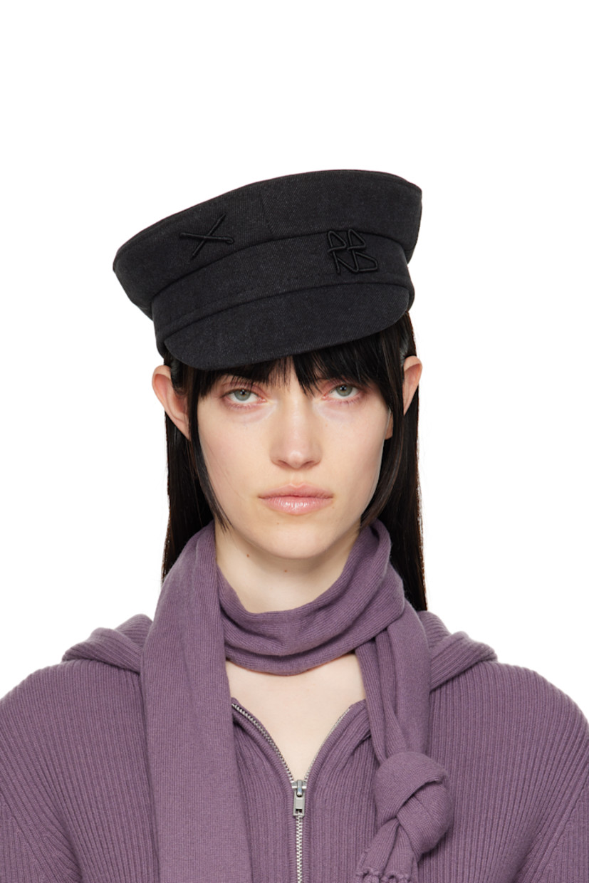 Non-stretch denim cap in black.

· Fading throughout
· Graphic and logo appliqué at face
· Cotton twill lining

Supplier color: Black