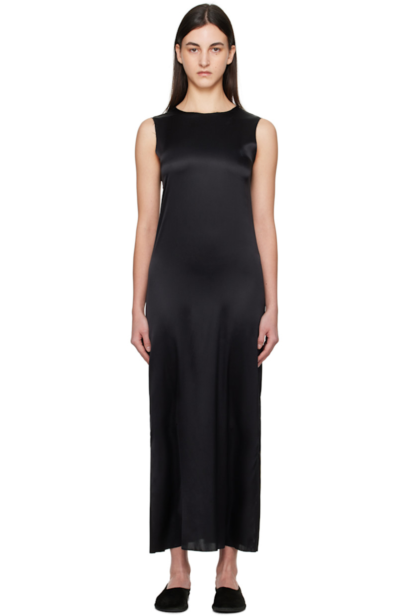 Handcrafted stretch silk satin maxi dress. 

· Raw edge at round neck, hem, and armscyes
· Slit at side seam
· Vent at back collar

Supplier color: Black