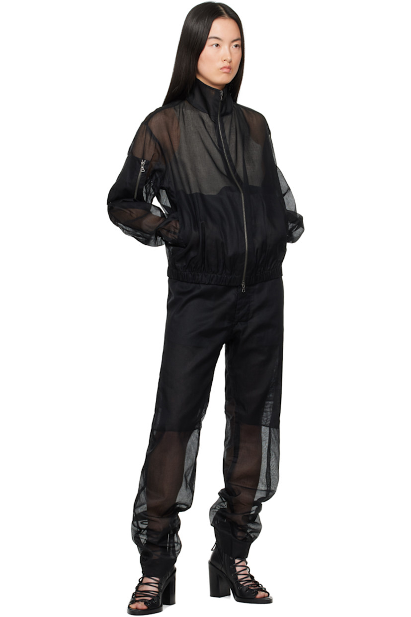 Sheer cotton taffeta trousers.

· Button fastening at waistband 
· Two-pocket styling
· Button fly 
· Partially lined

Each item is unique. Please note finishings may vary.

Supplier color: Black