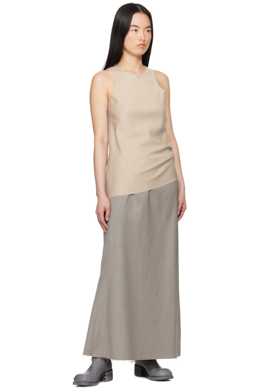 Plain-woven tank top. 

· Loro Piana superfine merino wool
· Raw edge at crewneck, hem, and armscyes.

Supplier color: Beige