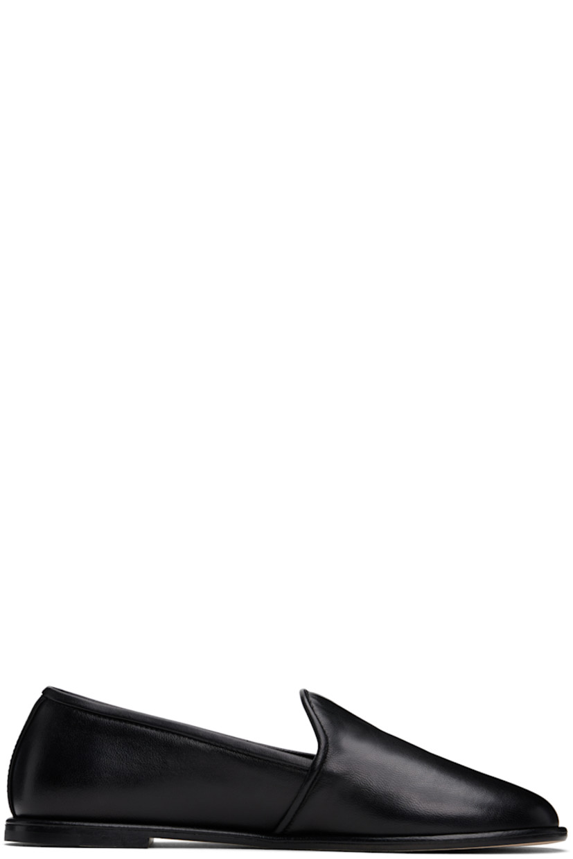 Handcrafted nappa leather loafers in black. 

· Logo stamp at padded leather footbed 
· Suede lining
· Stacked leather heel with rubber injection
· Nubuck sole

Supplier color: Black