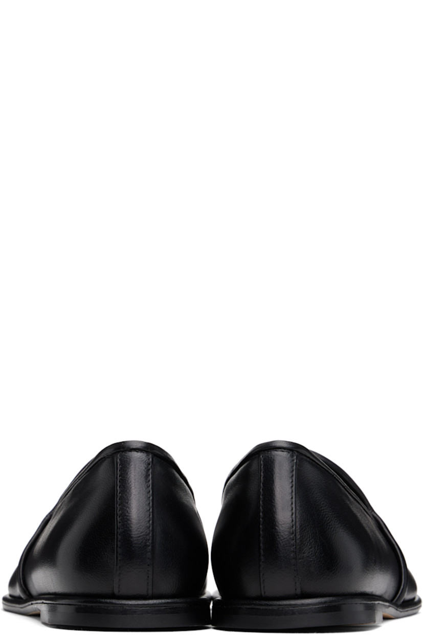 Handcrafted nappa leather loafers in black. 

· Logo stamp at padded leather footbed 
· Suede lining
· Stacked leather heel with rubber injection
· Nubuck sole

Supplier color: Black