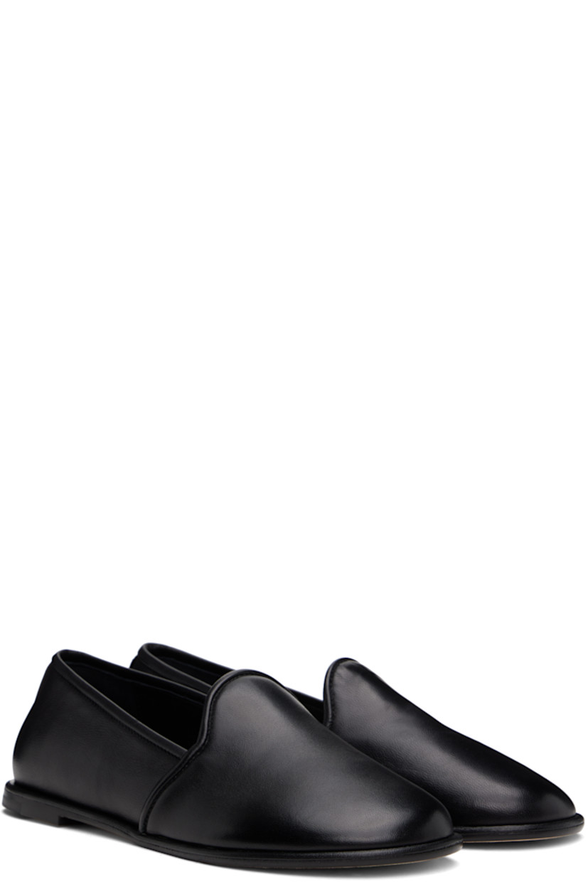 Handcrafted nappa leather loafers in black. 

· Logo stamp at padded leather footbed 
· Suede lining
· Stacked leather heel with rubber injection
· Nubuck sole

Supplier color: Black