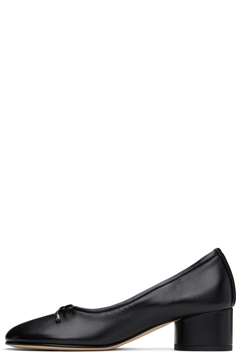 Handcrafted grained nappa leather heels in black 

· Hand-painted edges throughout 
· Bow accent at vamp
· Logo stamp at padded leather footbed
· Suede lining
· Covered block heel with rubber injection
· Nubuck sole
· Heel: H1.75"

Supplier color: Black