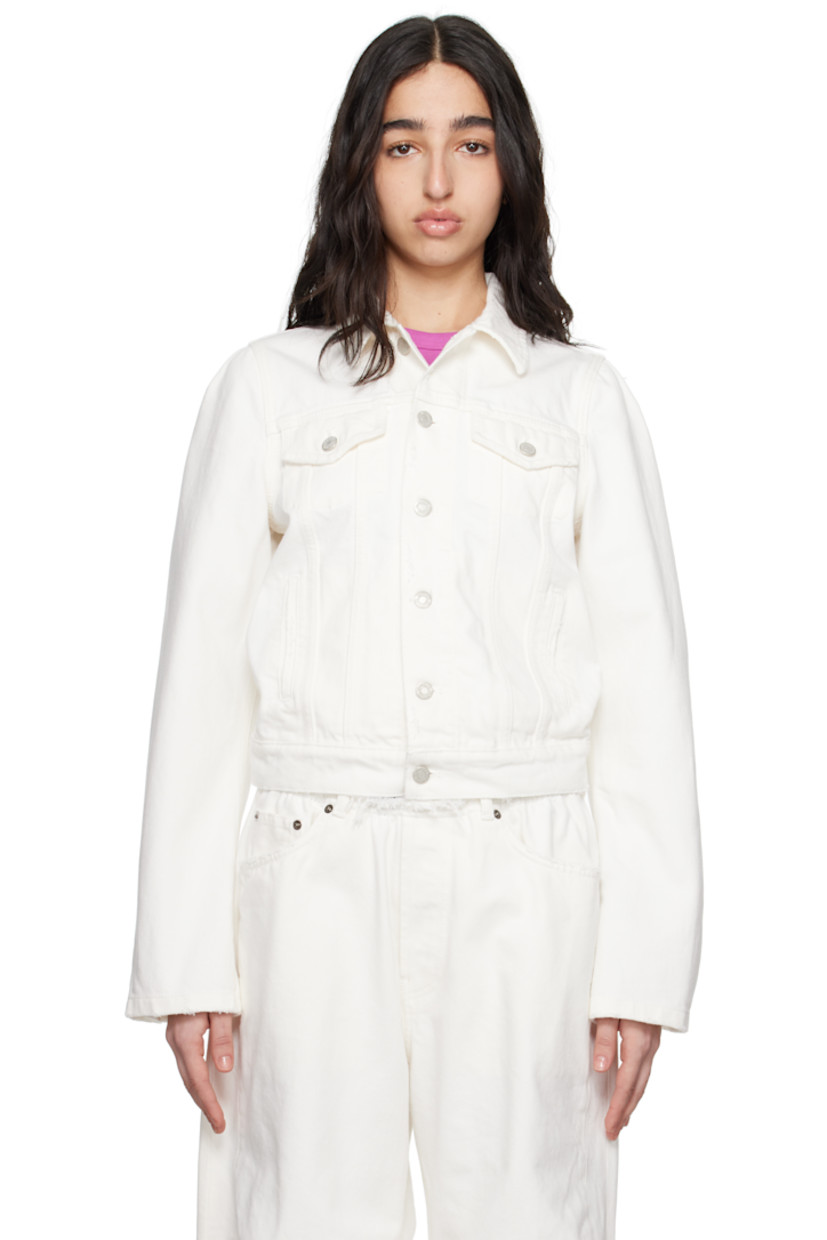 Non-stretch denim jacket. Subtle distressing throughout.

· Spread collar
· Button closure
· Flap and welt pockets
· Dart at shoulders
· Button fastening at cuffs
· Adjustable button tabs at back hem
· Logo-engraved antiqued silver-tone hardware

Supplier color: White wash