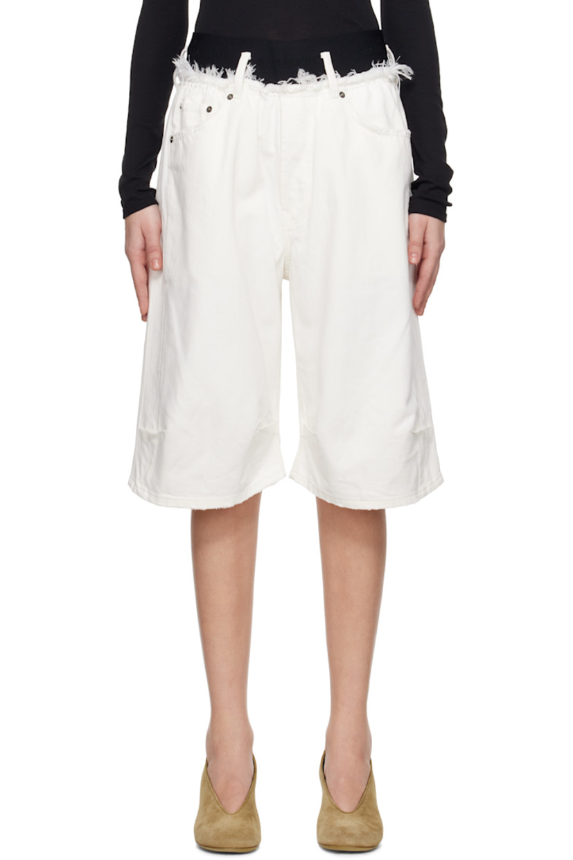 Non-stretch denim shorts. Subtle distressing throughout.

· Belt loops
· Frayed edge at logo-woven elasticized waistband
· Five-pocket styling
· Button-fly
· Tucks at front legs
· Logo-engraved antiqued silver-tone hardware

Supplier color: White wash