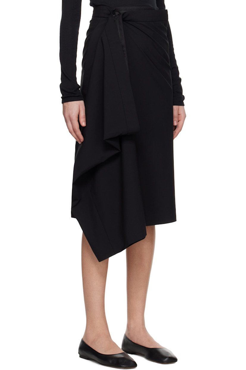 Stretch virgin wool-blend grain de poudre midi skirt.

· Wrap construction
· Single-pocket styling
· Button fastening at waistband
· Slit at back hem

Supplier color: Black