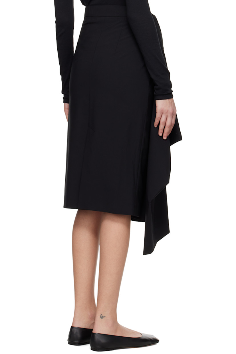 Stretch virgin wool-blend grain de poudre midi skirt.

· Wrap construction
· Single-pocket styling
· Button fastening at waistband
· Slit at back hem

Supplier color: Black