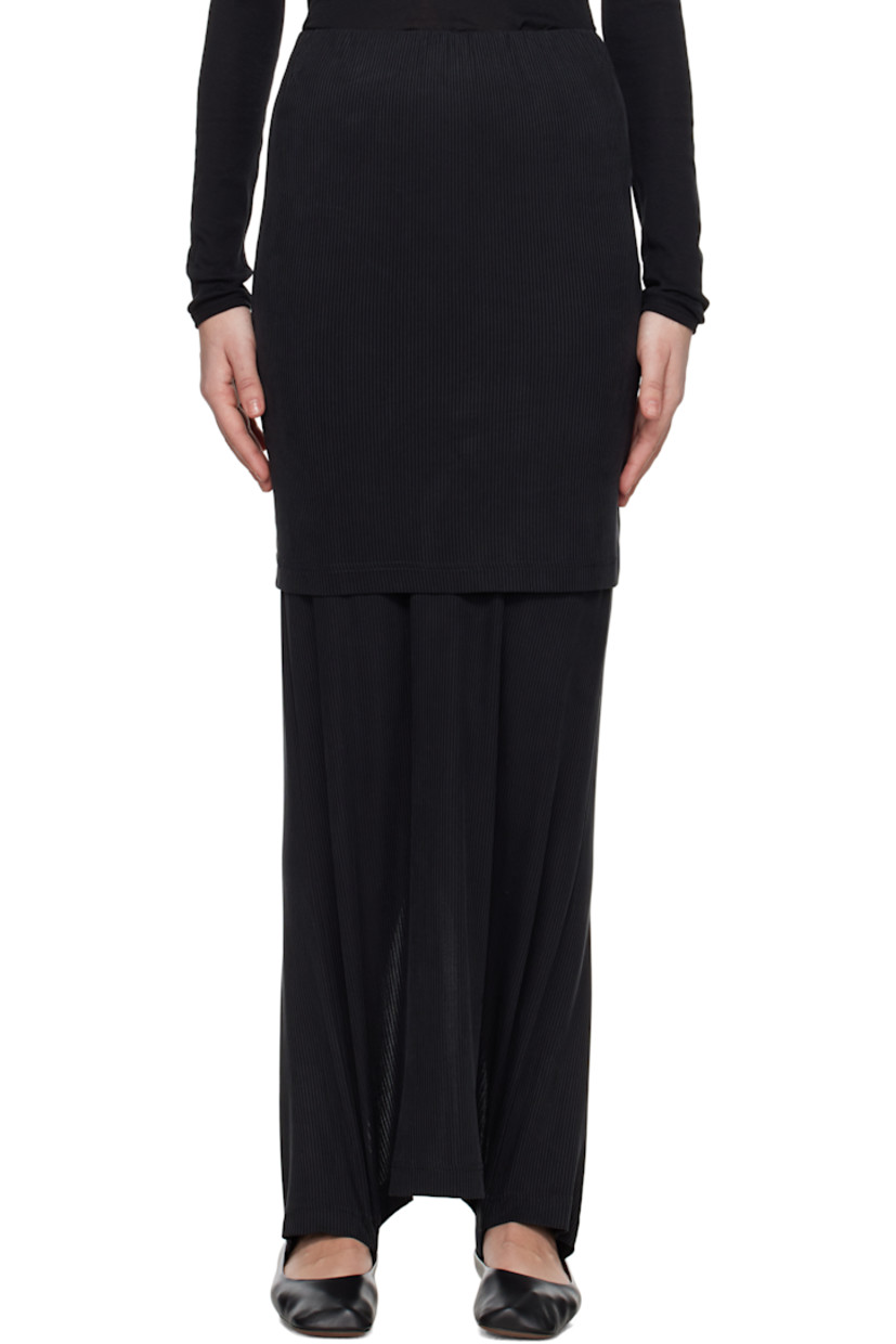 Stretch cupro rib-knit jersey maxi skirt.

· Elasticized waistband
· Logo-woven elasticized trim at tiered hem
· Slit at back hem

Supplier color: Black