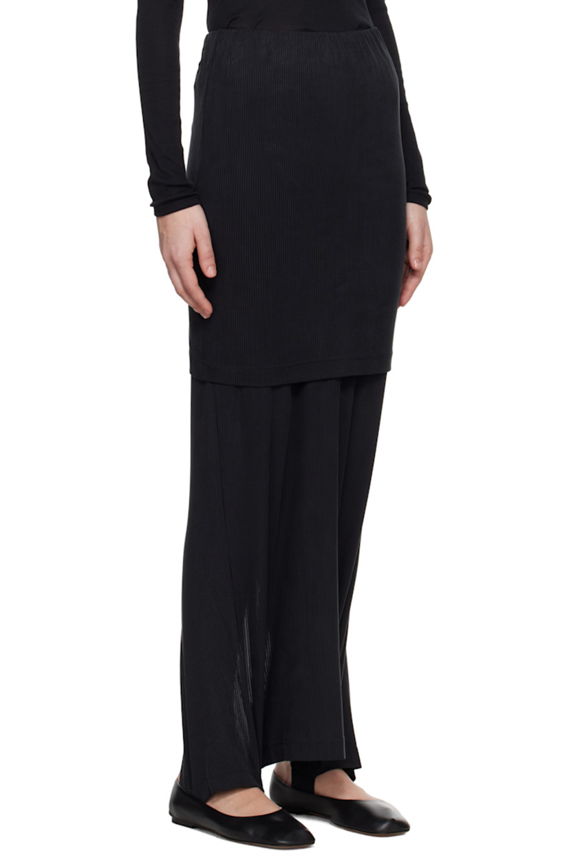 Stretch cupro rib-knit jersey maxi skirt.

· Elasticized waistband
· Logo-woven elasticized trim at tiered hem
· Slit at back hem

Supplier color: Black