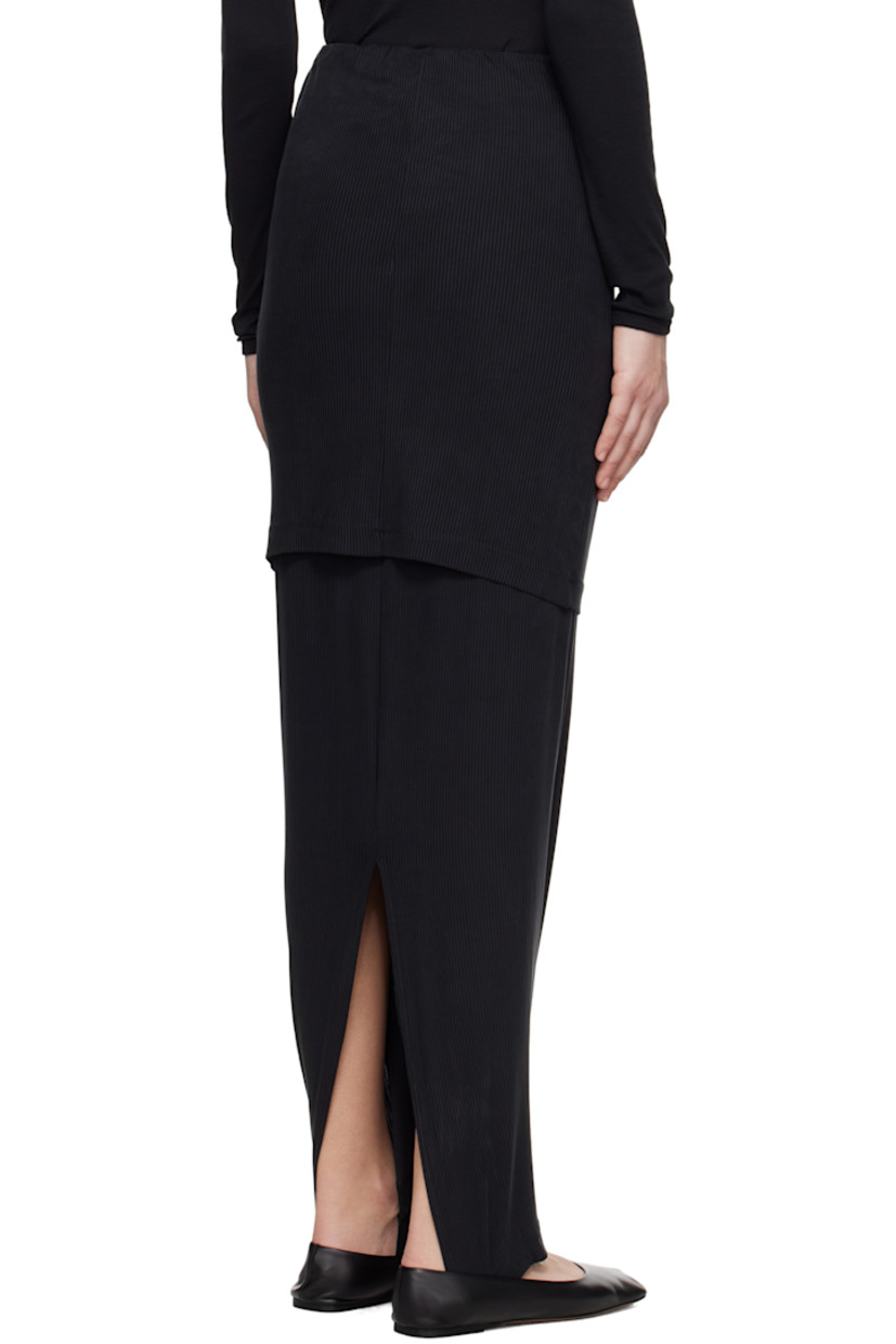 Stretch cupro rib-knit jersey maxi skirt.

· Elasticized waistband
· Logo-woven elasticized trim at tiered hem
· Slit at back hem

Supplier color: Black