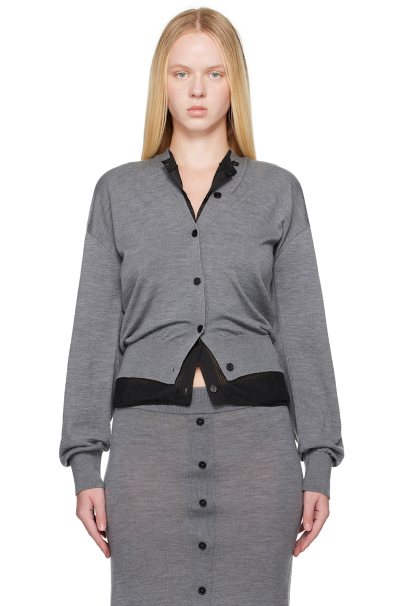 Knit merino wool cardigan.

· Rib-knit V-neck, hem, and cuffs
· Button closure extends to collar

Supplier color: Grey chine