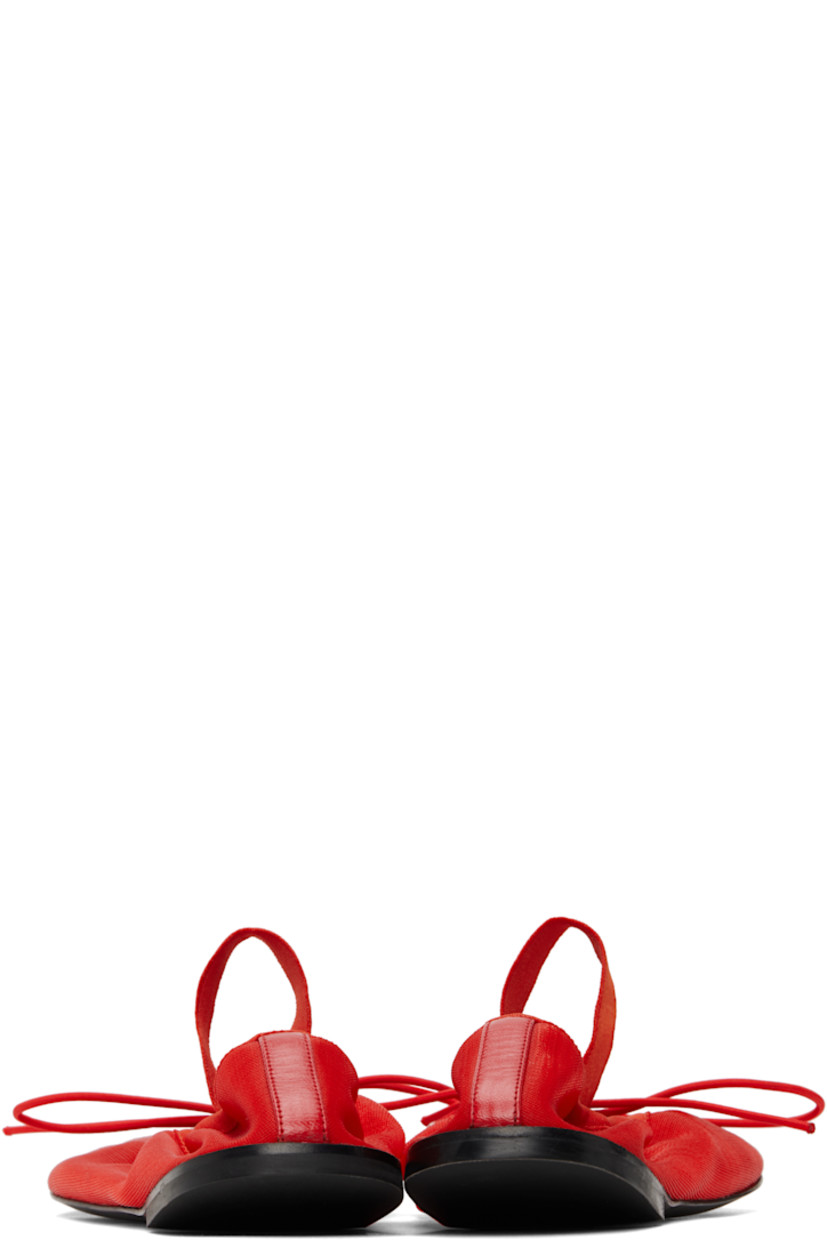 Semi-sheer mesh Mary Jane-style ballerina flats in red.

· Bow accent at vamp
· Elasticized strap and collar
· Calfskin sole with rubber injection

Supplier color: Red