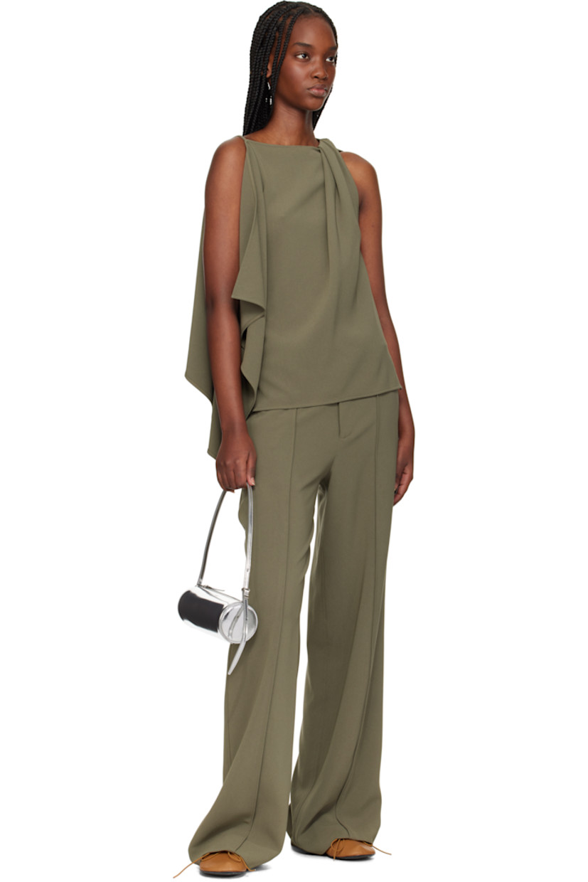 Grained lambskin Mary Jane-style ballerina flats in tan.

· Bow accent at vamp
· Elasticized strap and collar
· Rubber heel
· Calfskin sole with rubber injection

Supplier color: Tobacco