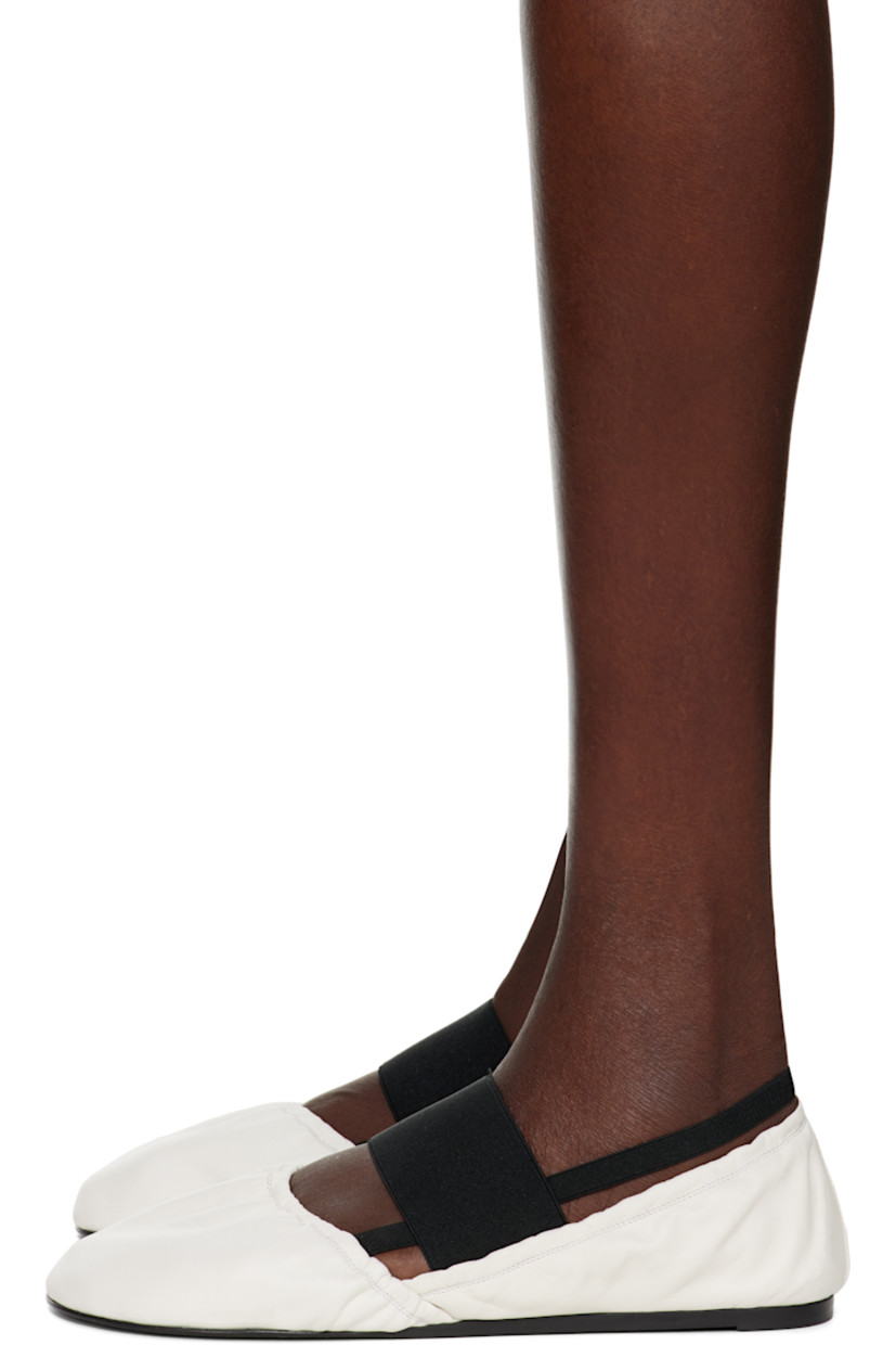 Buffed lambskin Mary Jane-style ballerina flats in white.

· Elasticized collar
· Elasticized straps at vamp
· Rubber heel
· Leather sole

Supplier color: White
