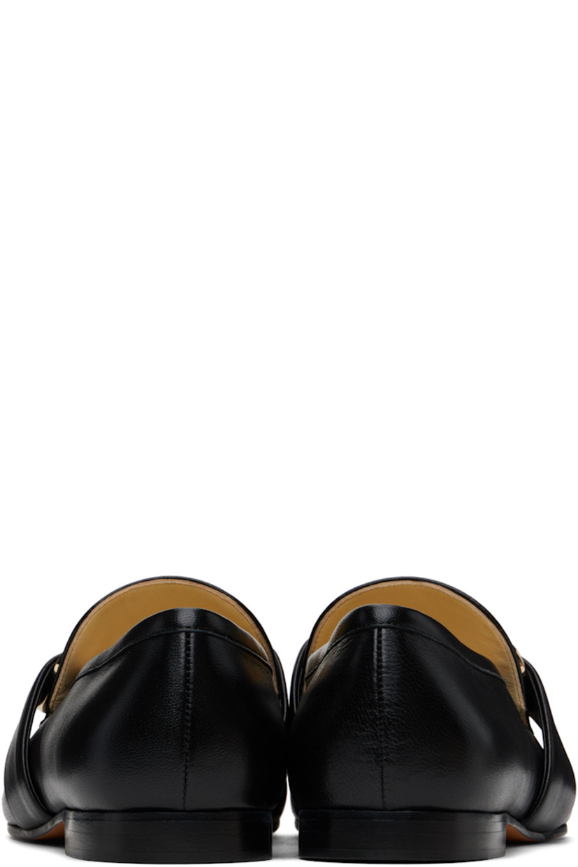 Buffed leather loafers in black.

· Moc toe
· Strap with logo hardware at vamp
· Stacked leather heel with rubber injection
· Leather sole

Supplier color: Black