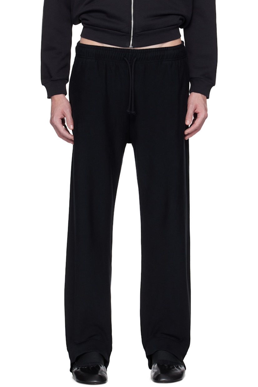 Stretch French terry sweatpants.

· Drawstring at elasticized waistband
· Two-pocket styling
· Stirrup at rib-knit cuffs
· Logo patch at back

Supplier color: Black stonewash