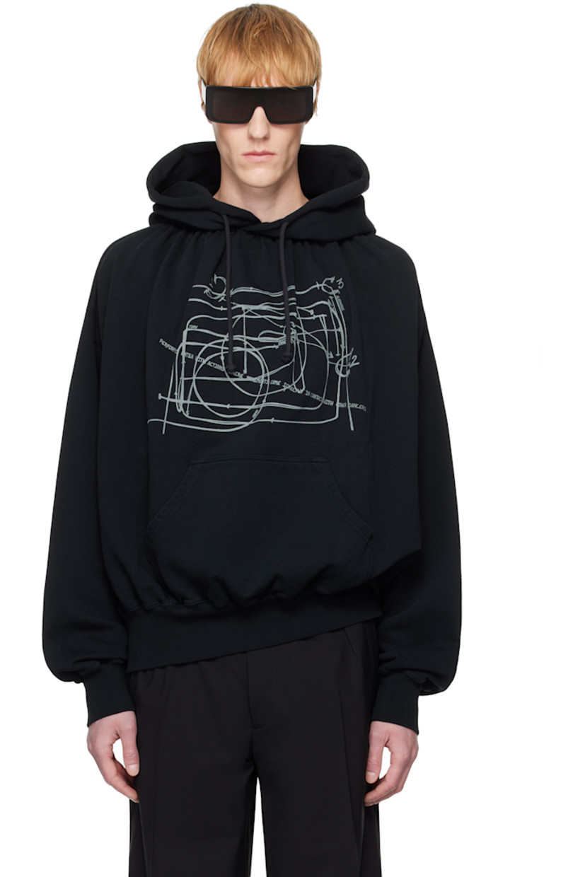 Stretch French terry hoodie. 

· Drawstring at hood
· Gathering at collar
· Logo, graphic, and text printed at front
· Kangaroo pocket
· Rib-knit hem and cuffs
· Dropped shoulders
· Logo embroidered at back collar

Supplier color: Stone wash black