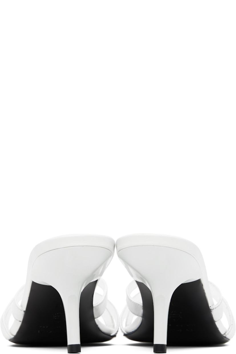 Creased calfskin heeled sandals in white. 

· Open toe
· Crisscrossing straps at vamp
· Logo embossed at molded footbed
· Covered heel with rubber injection
· Polished leather sole
· Heel: H3"

Supplier color: Burrata
