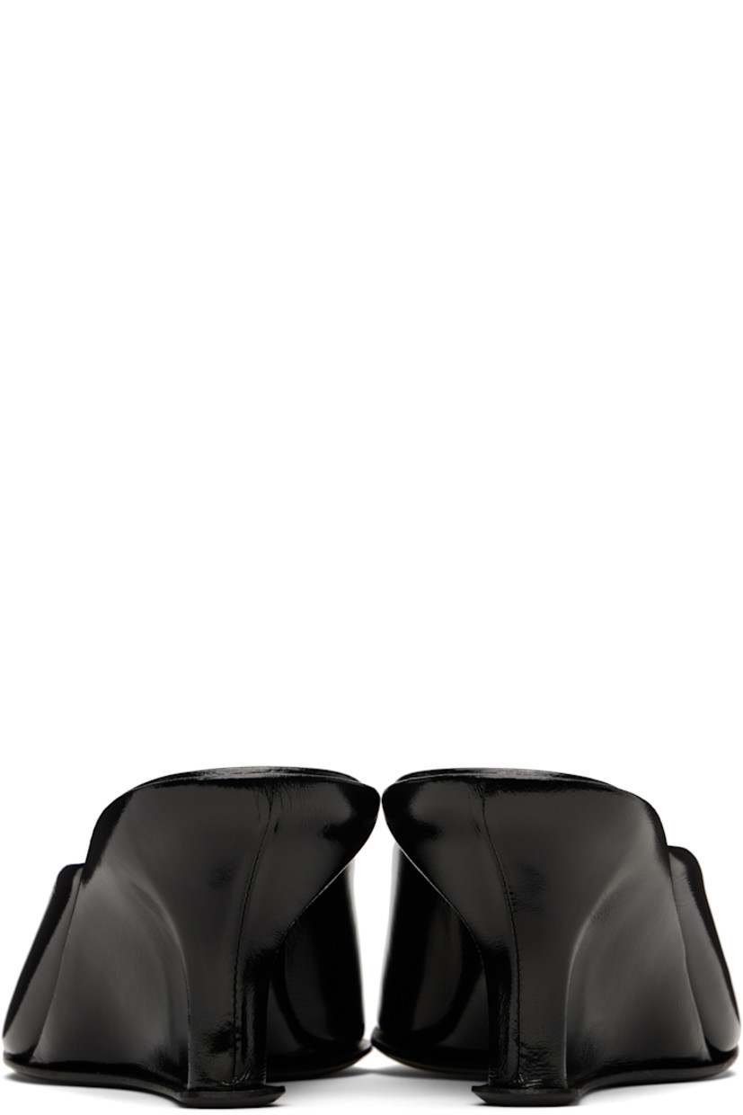 Polished lambskin mules in black.

· Open toe
· Strap at vamp
· Covered wedge heel 
· Logo embossed at footbed
· Nubuck sole with rubber injection
· Heel: H2.5"

Supplier color: Black