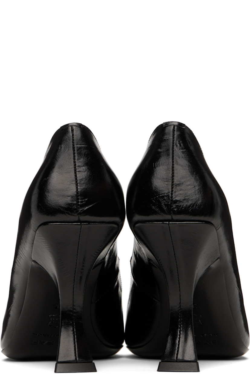 Eel-embossed polished leather heels in black.

· Pointed toe
· Buffed leather and suede lining
· Covered spool heel with rubber injection
· Polished leather sole
· Heel: H3.25"

Supplier color: Black