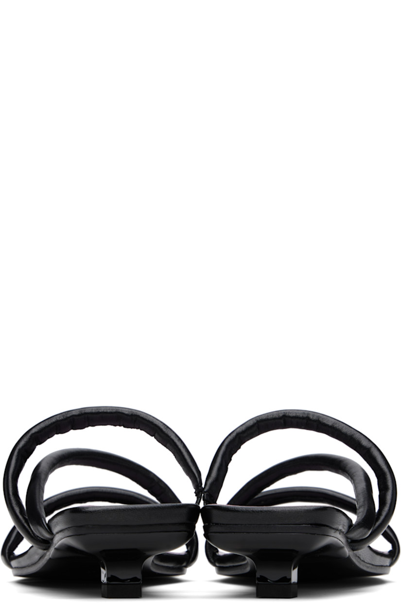 Buffed nappa leather heeled sandals in black. 

· Open square toe
· Padded and partially elasticized straps at vamp
· Logo embossed at molded footbed
· Covered kitten heel with rubber injection
· Polished leather sole
· Heel: H1.25"

Supplier color: Black