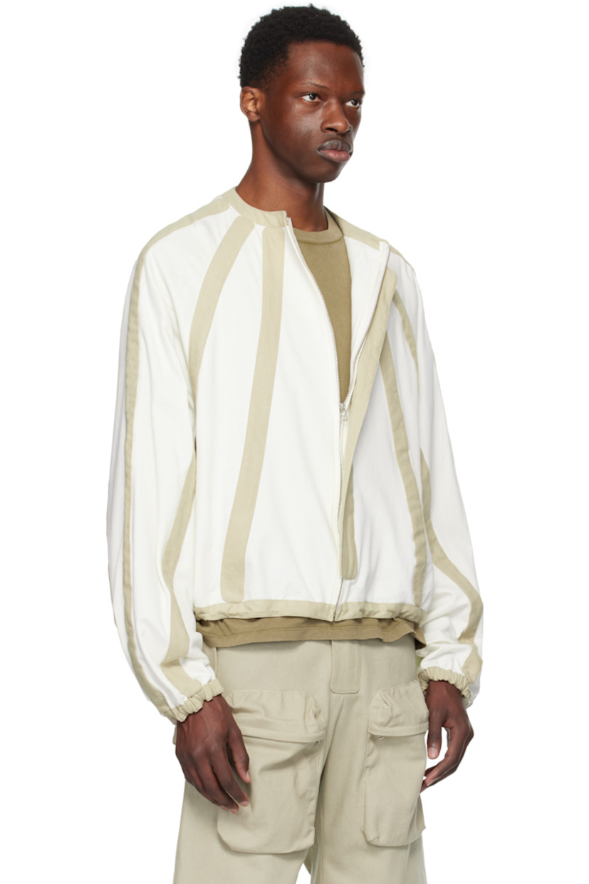 French terry cardigan. Hopsack stripe panels throughout.

· Round neck
· Zip closure
· Concealed bungee-style drawstring at hem
· Raglan sleeves
· Elasticized cuffs

Supplier color: Cloud dancer