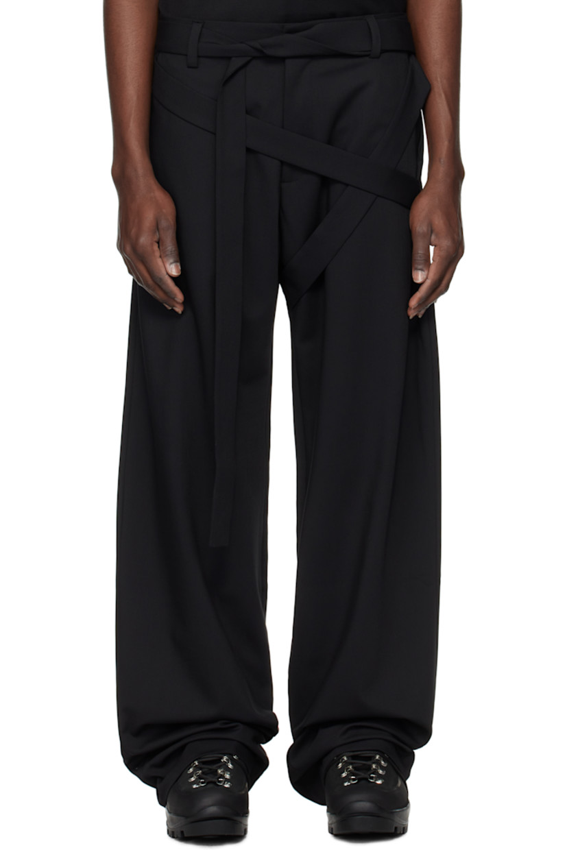 Stretch recycled polyester- and wool-blend twill trousers.

· Belt loops
· Modified wraparound self-tie belt
· Four-pocket styling
· Zip fly
· Partially lined

Supplier color: Black
