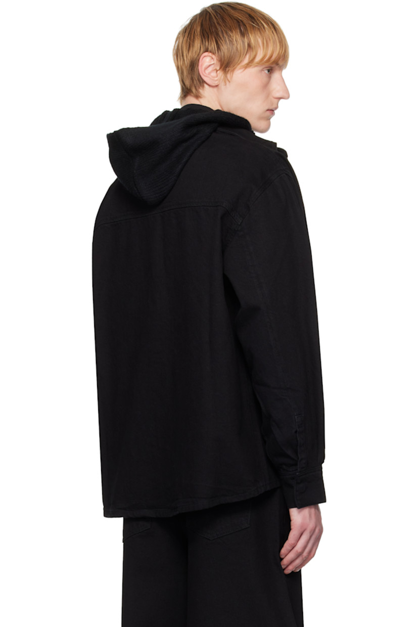 Oversized non-stretch denim shirt. 

· Spread collar
· Concealed press-stud closure
· Cutout and inset logo plaque at chest
· Dropped shoulders
· Press-stud barrel cuffs

Supplier color: Black