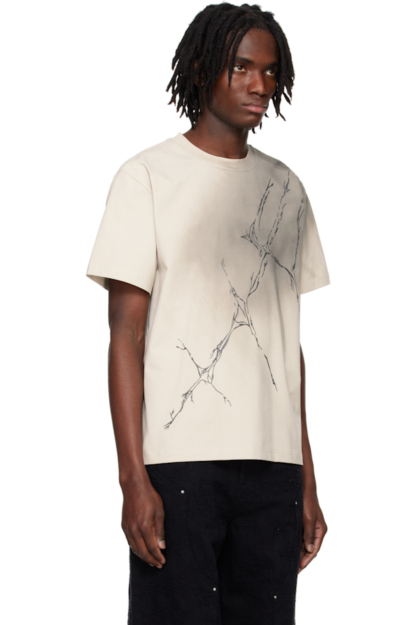 Stretch cotton jersey T-shirt. Fading throughout.

· Rib-knit crewneck
· Graphic bonded at front 
· Text printed at back

Supplier color: Stone