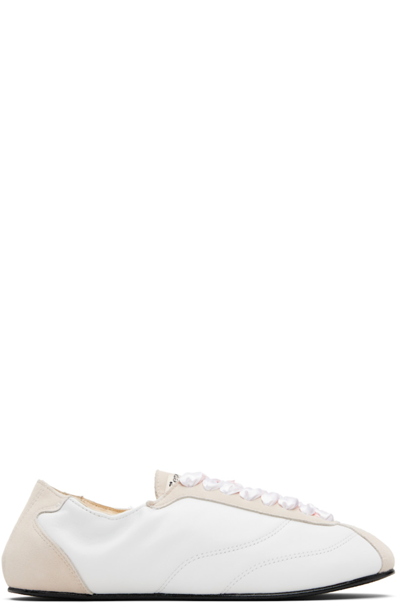 Low-top grained sheepskin and goatskin suede sneakers.

· Satin lace-up closure
· Logo patch at tongue
· Elasticized collar
· Buffed lambskin lining
· Crêpe rubber sole

Supplier color: White