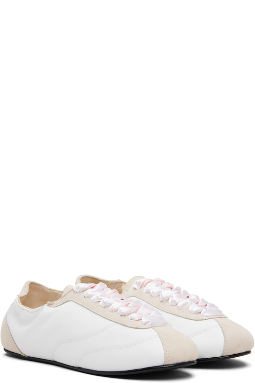 Low-top grained sheepskin and goatskin suede sneakers.

· Satin lace-up closure
· Logo patch at tongue
· Elasticized collar
· Buffed lambskin lining
· Crêpe rubber sole

Supplier color: White