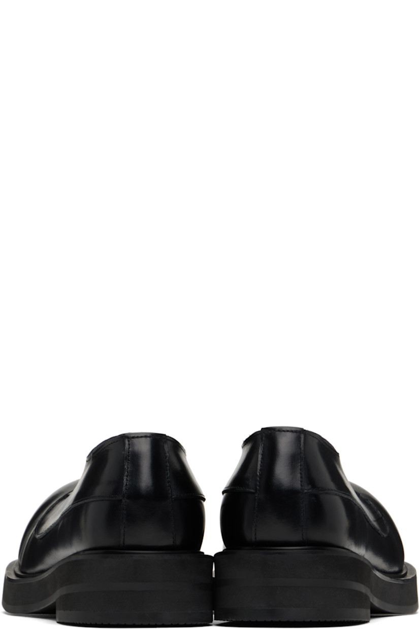 Handcrafted polished calfskin derbys in black.

· Pinched seam at vamp
· Lace-up closure
· Buffed leather lining
· Stacked foam rubber heel and midsole
· Vibram® rubber sole
· Heel: H1.5"

Supplier color: Plane black