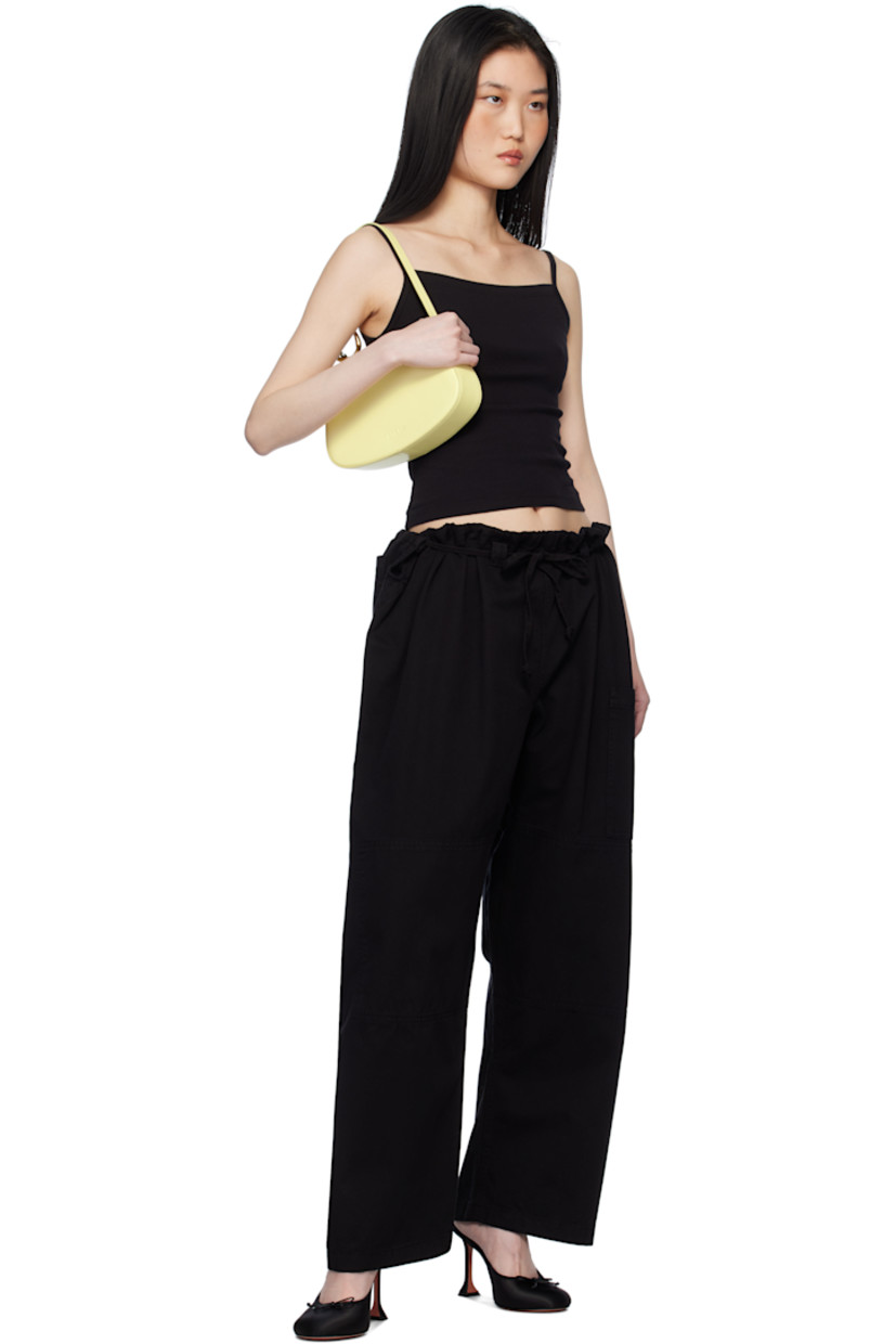 Enzyme-washed cotton twill lounge pants.

· Paneled construction
· Drawstring at waistband
· Cutouts at waist
· Patch pocket at outseam and back

Supplier color: Black